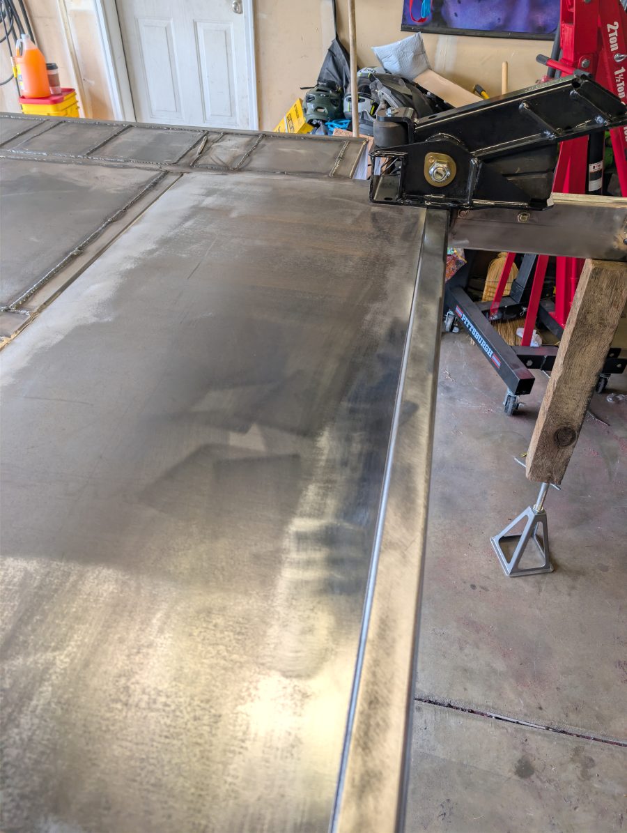Test fitting the axle-less axle mount and tracing out the floor plate to cut a hole for the future axle retention plates