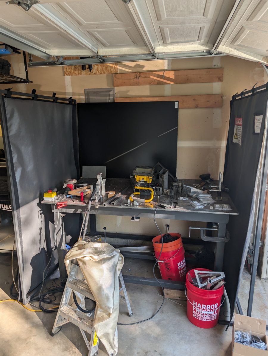 Laser welding test booth, laser rated curtains and the hard barrier (which has a much higher rated laser time) are very spendy. The garage door is closed when using the laser. I'll probably buy another curtain eventually.